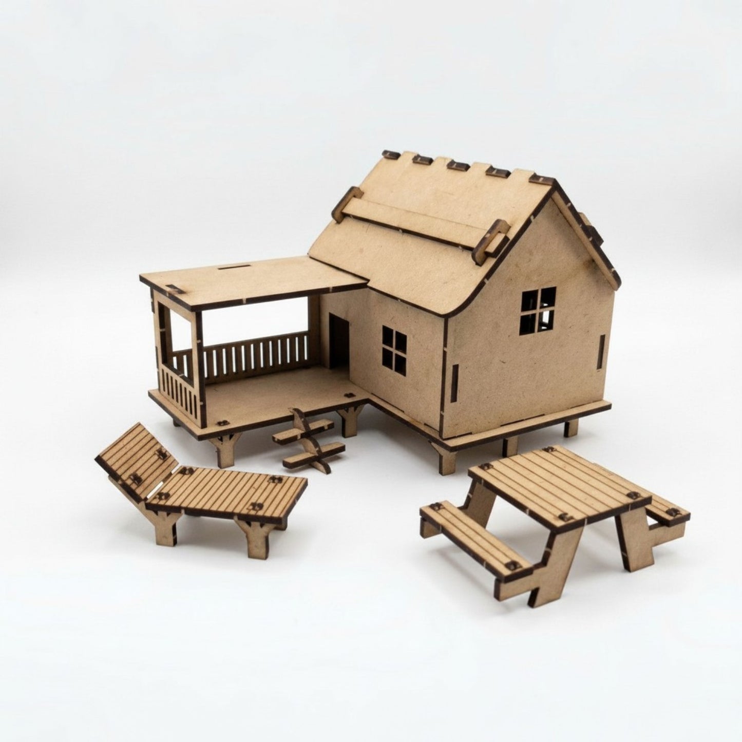 Coastal Creek Beach House unpainted wood kit on white background
